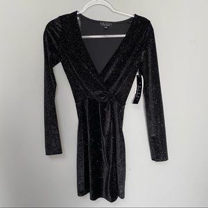 Bodycon sparkly little black dress